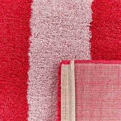 Alfombra interior con rayas rojas y rosas
