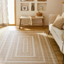 Alfombra interior/exterior efecto tela de yute beige con motivos