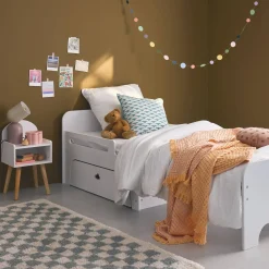 Cama infantil convertible con cajón