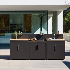 Cocina de exterior 3 módulos acero y decoración de madera