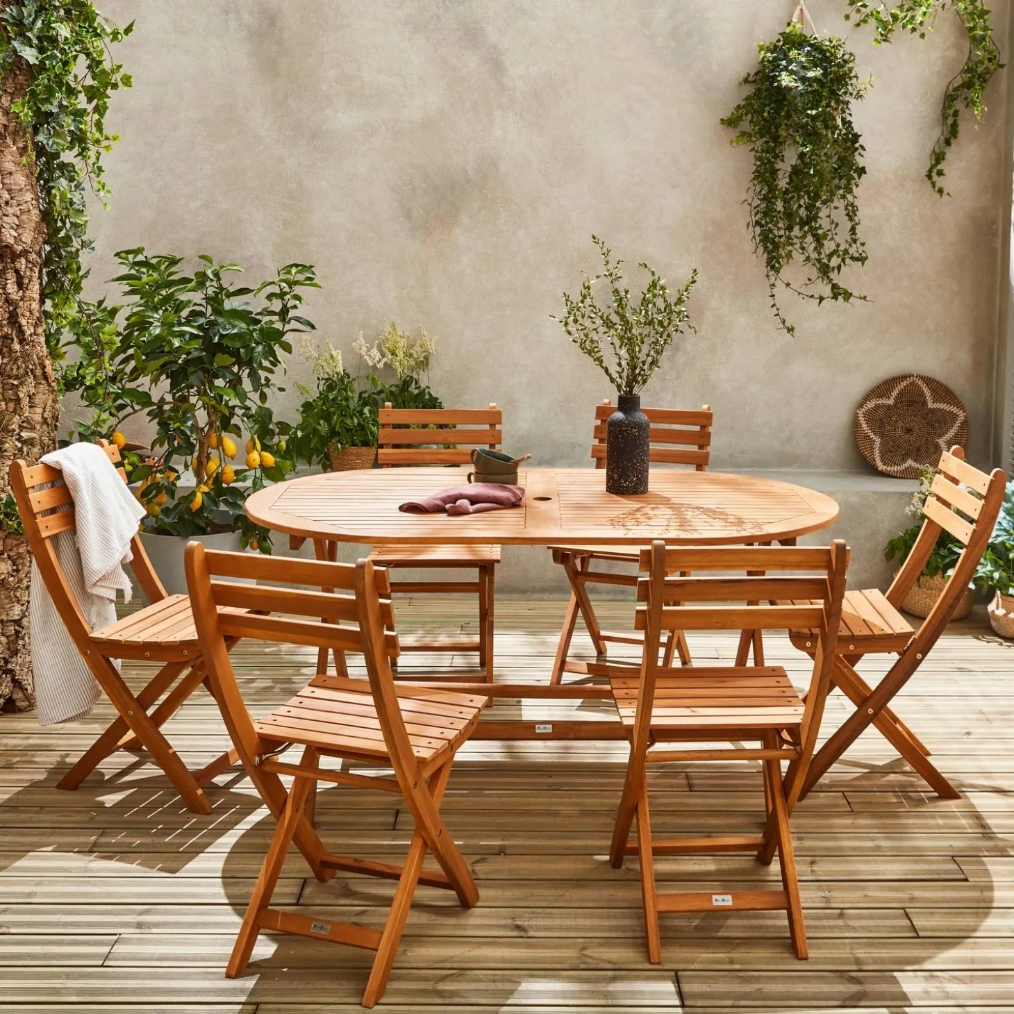Conjunto mesa de jardín plegable de madera ovalada con 6 sillas
