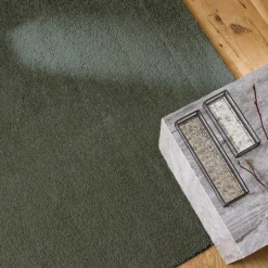 Moqueta interior de terciopelo rizado verde oscuro