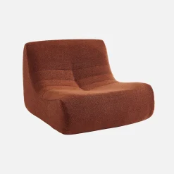 Sillón de borreguito texturizada con reposapiés