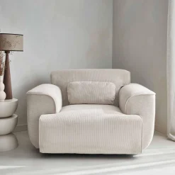 Sillón de pana con cojín