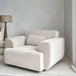 Sillón de pana con cojín