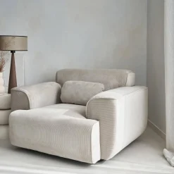 Sillón de pana con cojín