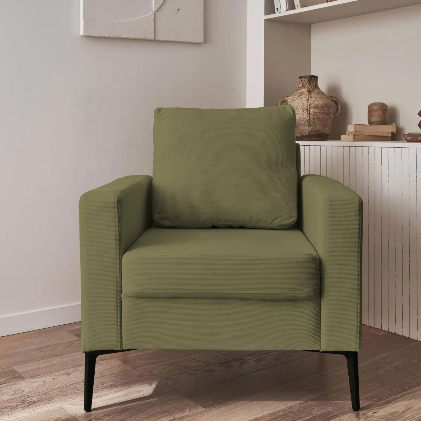 Sillón de pana y patas de metal
