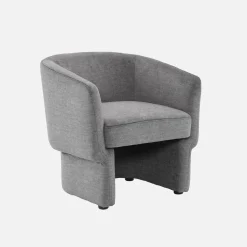 Sillón de tela con respaldo y base redondeada