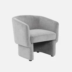 Sillón de tela con respaldo y base redondeada