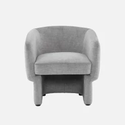 Sillón de tela con respaldo y base redondeada