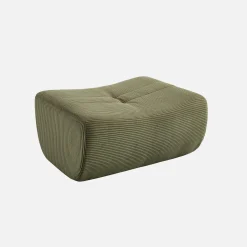 Sillón de terciopelo de pana fina con reposapiés