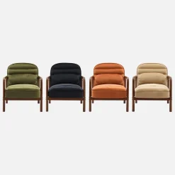 Sillón escandinavo de madera de hevea teñida de nogal y tela de terciopelo