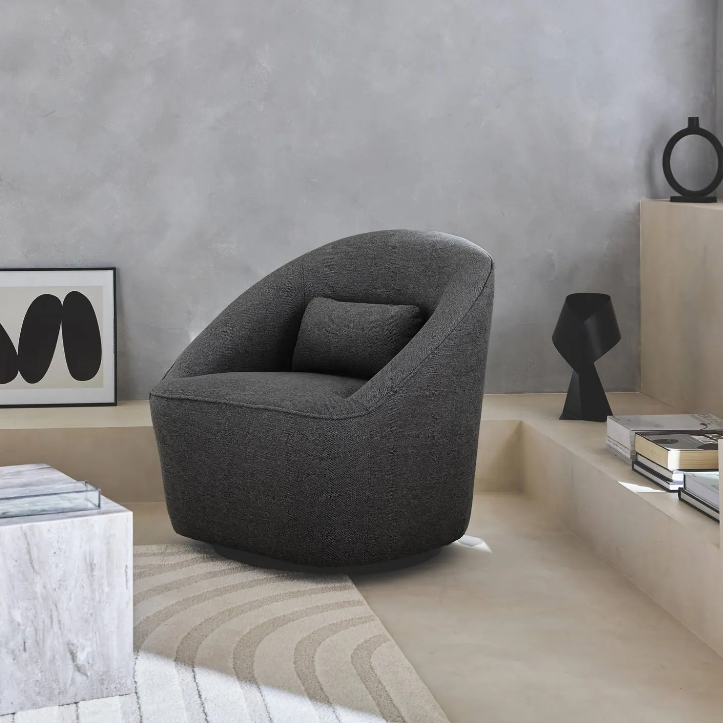 Sillón giratorio de tela 360º con cojín