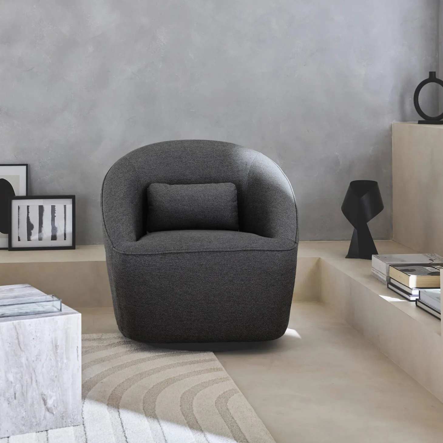 Sillón giratorio de tela 360º con cojín