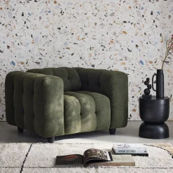 Sillón tapizado en tejido borreguito