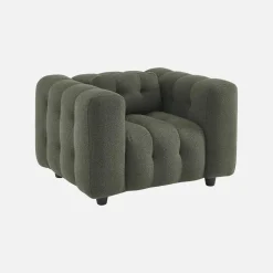 Sillón tapizado en tejido borreguito