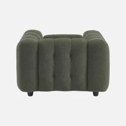 Sillón tapizado en tejido borreguito