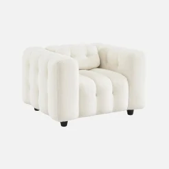 Sillón tapizado en tejido borreguito