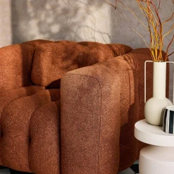 Sillón tapizado en tejido borreguito