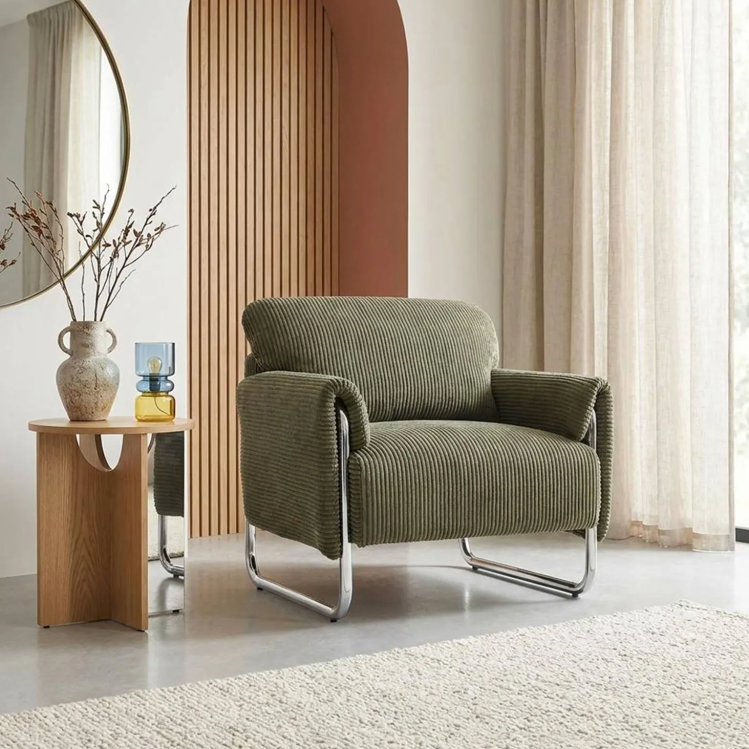 Sillón vintage de pana con estructura cromada
