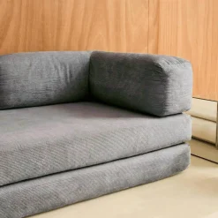 Sofá cama con futón plegable en pana y estructura cromada, 3 plazas