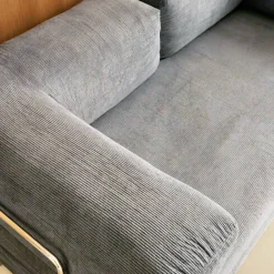 Sofá cama con futón plegable en pana y estructura cromada, 3 plazas