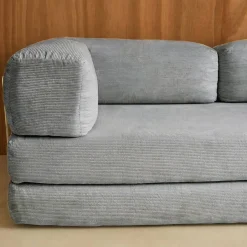 Sofá cama con futón plegable en pana y estructura cromada, 3 plazas