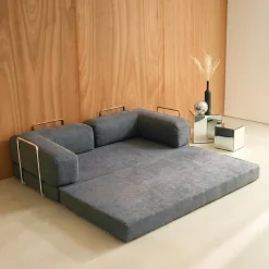 Sofá cama con futón plegable en pana y estructura cromada, 3 plazas