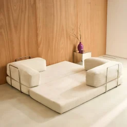 Sofá cama con futón plegable en pana y estructura cromada, 3 plazas