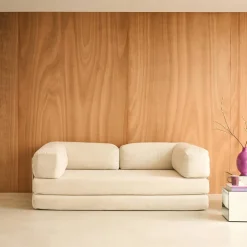 Sofá cama con futón plegable en pana y estructura cromada, 3 plazas