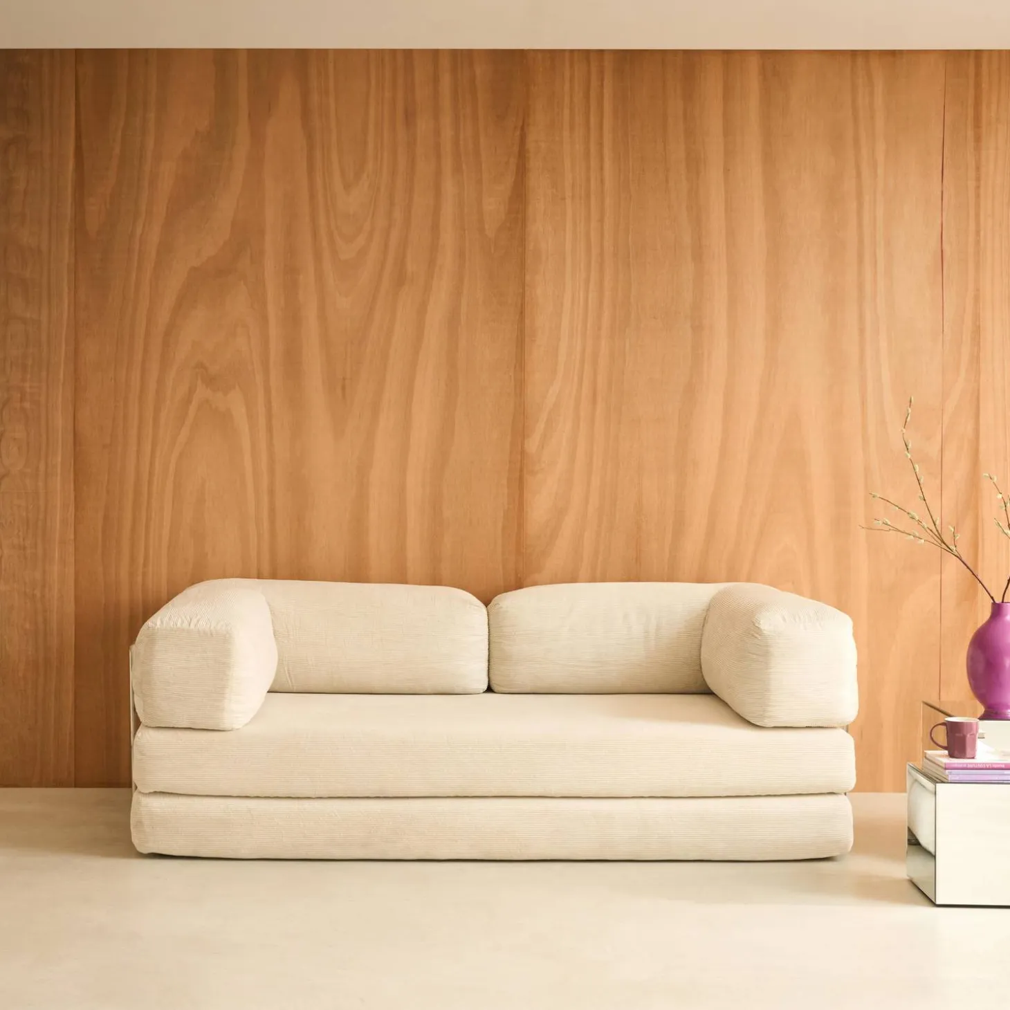 Sofá cama con futón plegable en pana y estructura cromada, 3 plazas