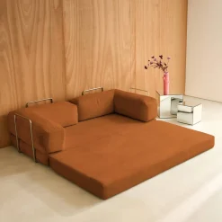 Sofá cama con futón plegable en pana y estructura cromada, 3 plazas