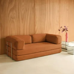 Sofá cama con futón plegable en pana y estructura cromada, 3 plazas