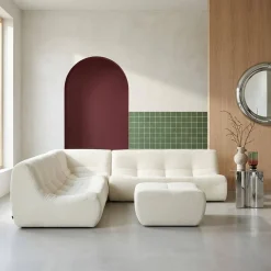 Sofá esquinero modular con reposapiés de borreguito texturizada, 7 plazas